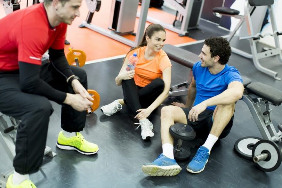 Young people resting at gym