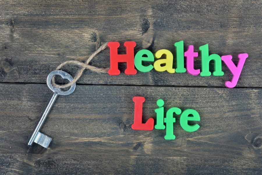 Healthy life word on wooden table