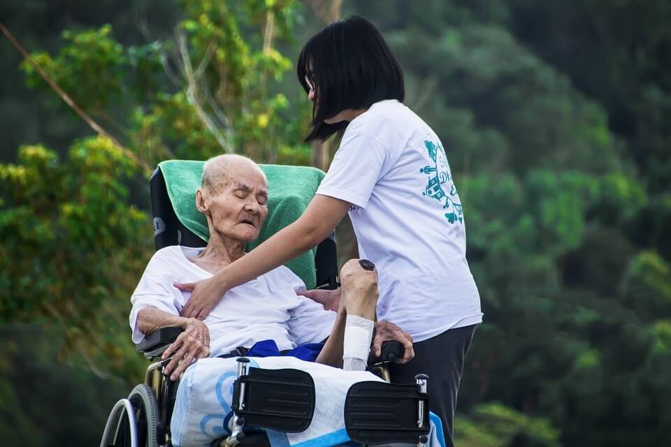 Old woman in a wheelchair