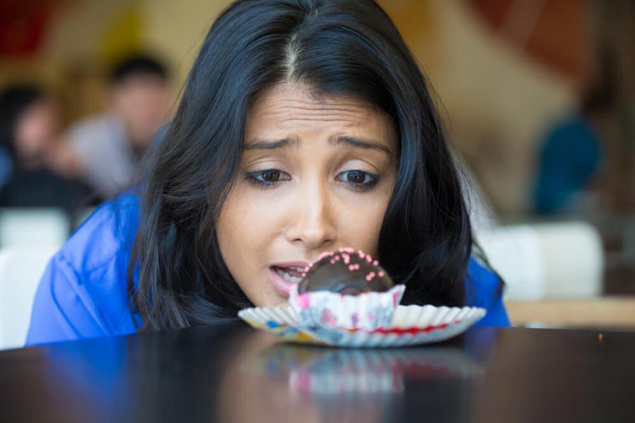 desperate woman in blue shirt craving fudge