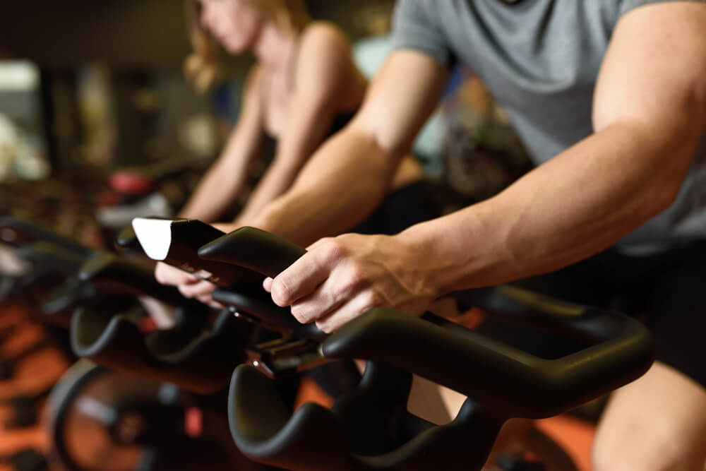 man biking in the gym