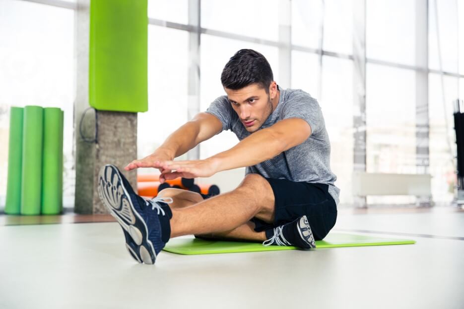 man doing stretching exercises