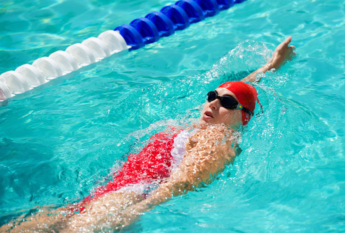 woman executing a backstroke