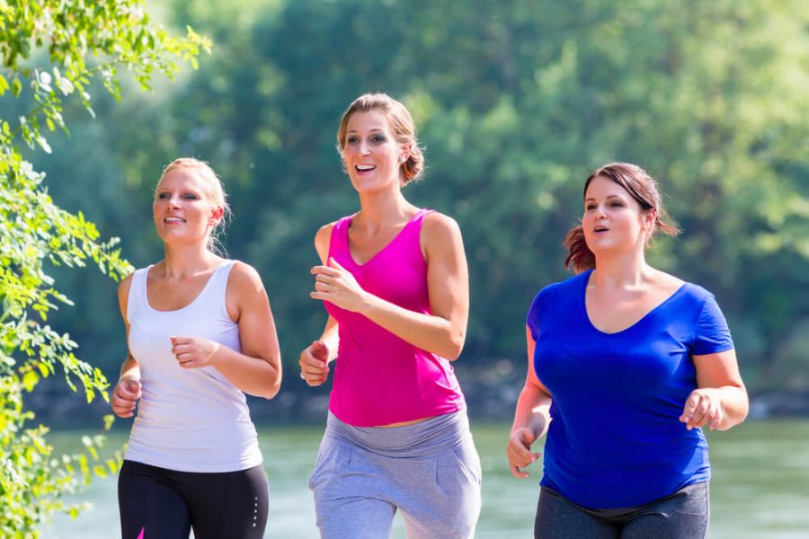 women running at lakeside jogging